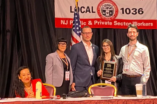 Member receiving an award. 