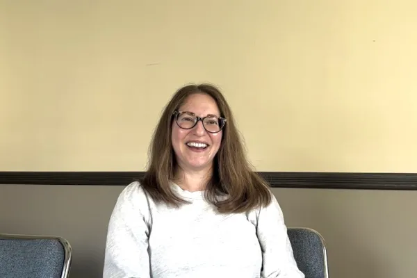 Photo of DEP member smiling at the camera