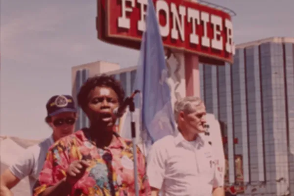 Hattie Canty in front of the Frontier Hotel giving a speech