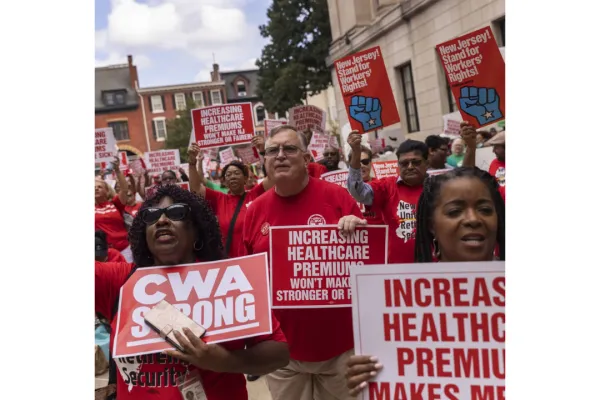 CWA members protesting healthcare premium hikes
