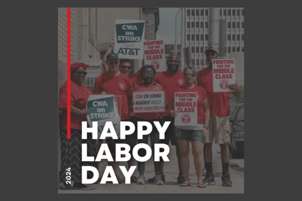 AT&T workers on the picket line with "Happy Labor Day" overlaid 