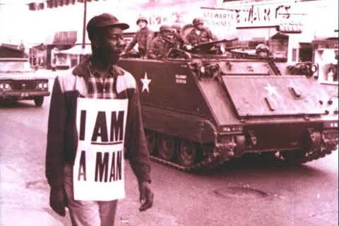 At the River I stand
